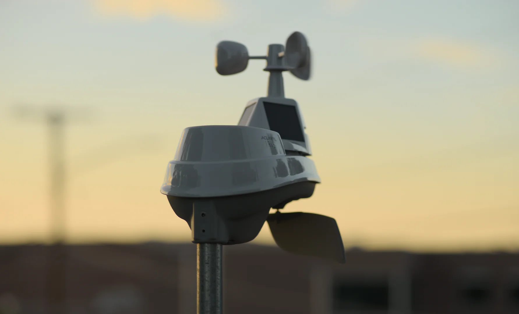 AcuRite 5-in-1 weather sensor mounted above the roofline